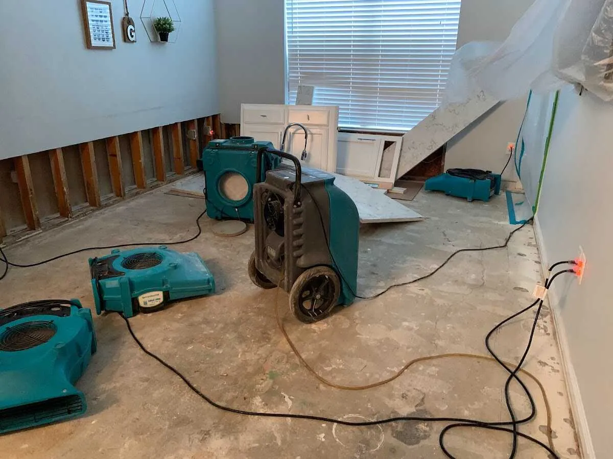 Dehumidifier in flood-cut room for Water Damage Restoration in Pensacola